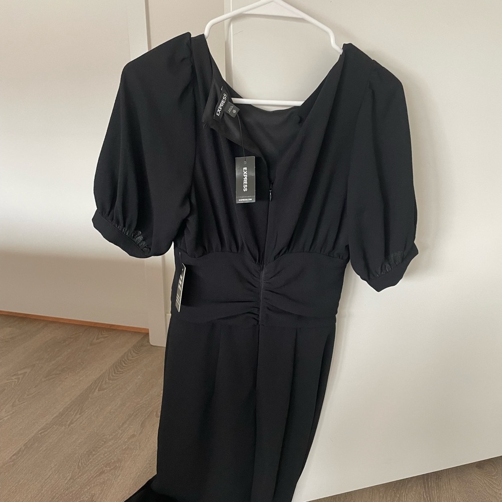 NEW WITH TAGS NEVER BEEN WORN black express dress